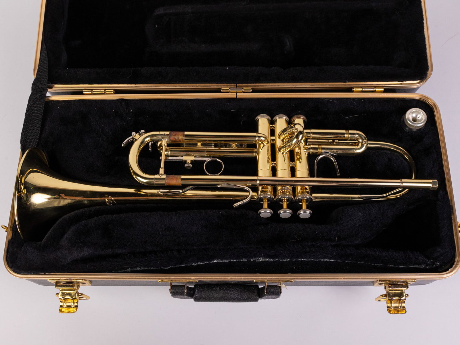 Vintage Bach Liberty Trumpet w/ Hard Case: Vintage Bach Liberty Trumpet w/ Hard Case Size 6" x 22" x 9" Literature Brooks Auction – Online Auction Terms & Conditions Contact: (856) 694-2960 | info@brooks.auction READ BEFORE YOU BID:<