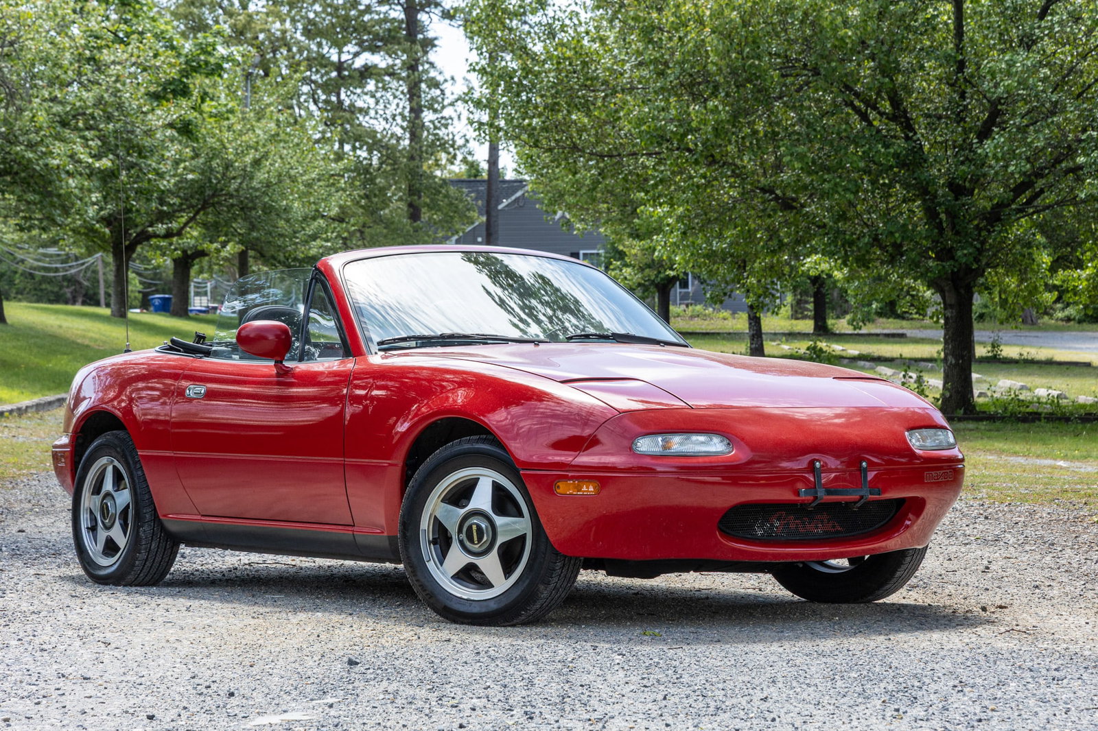 1992 Mazda Miata Convertible: 1992 Mazda Miata, If you're looking for the perfect weekend getaway car to drive down to the beach in style this summer, then look no further! Even just by looking at this beautiful cherry red 1992