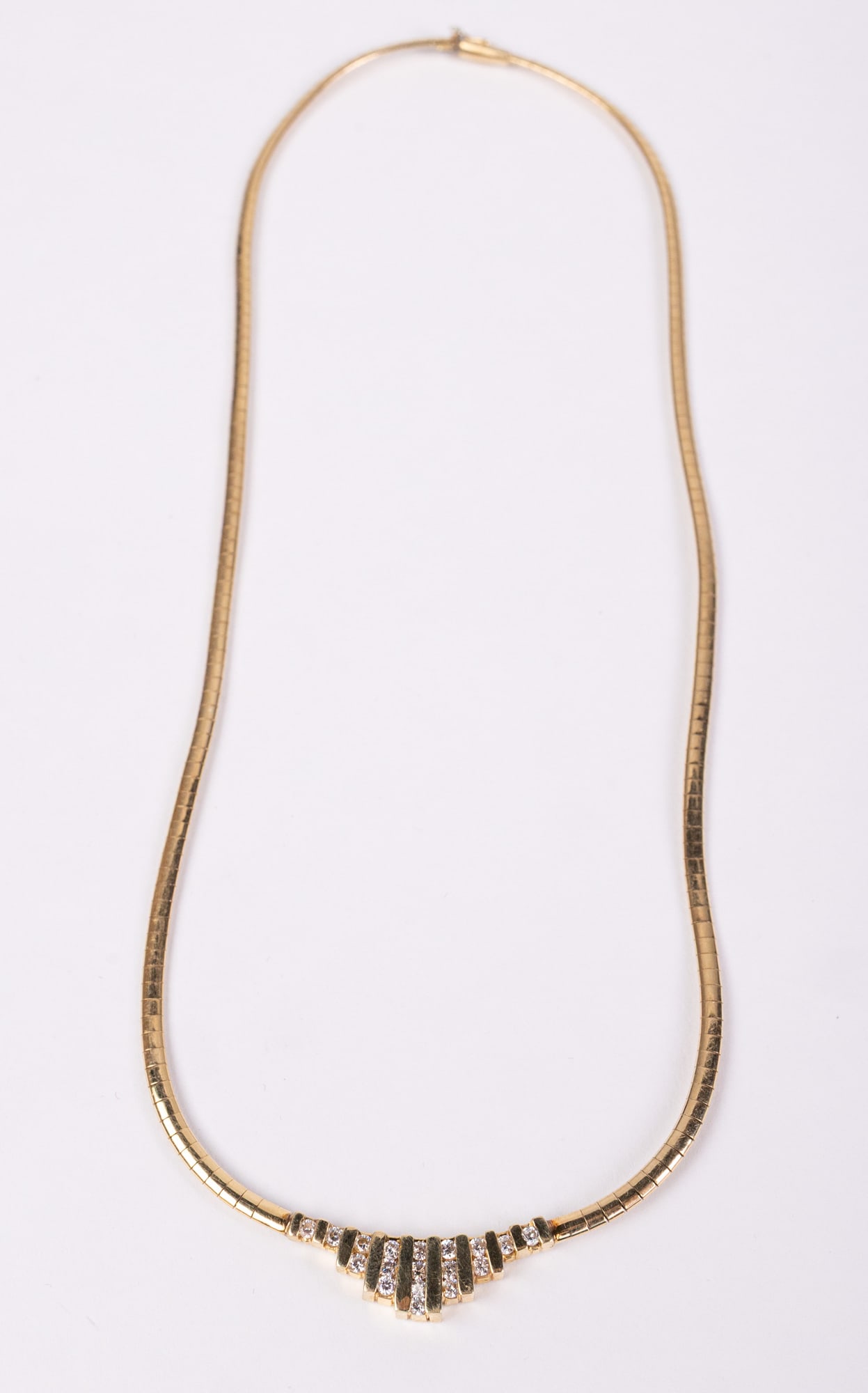 Vintage Italian 14KY Gold Omega Necklace: Vintage Italian 14KY Gold Omega Necklace: 15.7g, Marked "GC 14K ITALY" Literature Brooks Auction – Online Auction Terms & Conditions Contact: (856) 694-2960 | info@brooks.auction READ BEFORE
