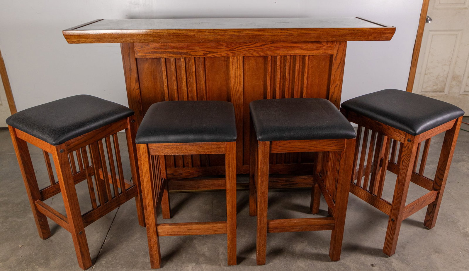 Vintage Oak Mission-Style Bar & Stool Set: Vintage Oak Mission-Style Bar & Stool Set Size 42" x 73" x 24" Literature Brooks Auction – Online Auction Terms & Conditions Contact: (856) 694-2960 | info@brooks.auction READ BEFORE YOU BID:
