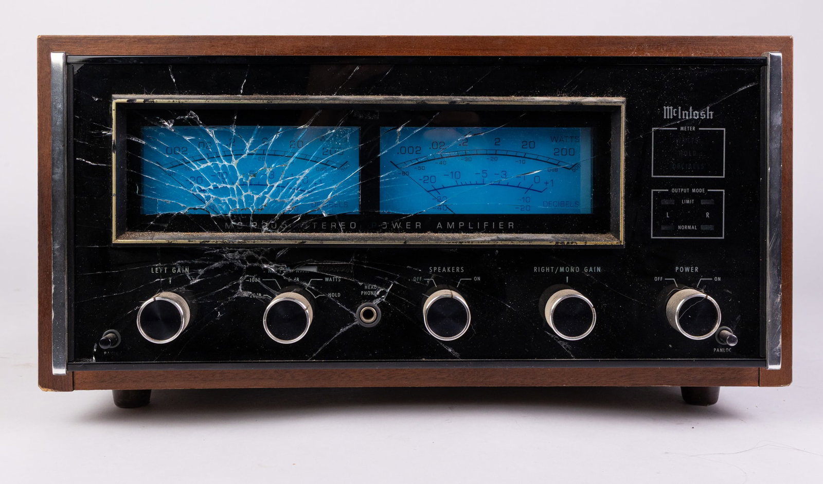 McIntosh MC 2205 Power Amplifier: McIntosh MC 2205 Power Amplifier, As seen in photos, the front screen unfortunately has significant damage, but it does light up and power on when plugged in. Size 9" x 17" x 15" Literature Brooks Auc