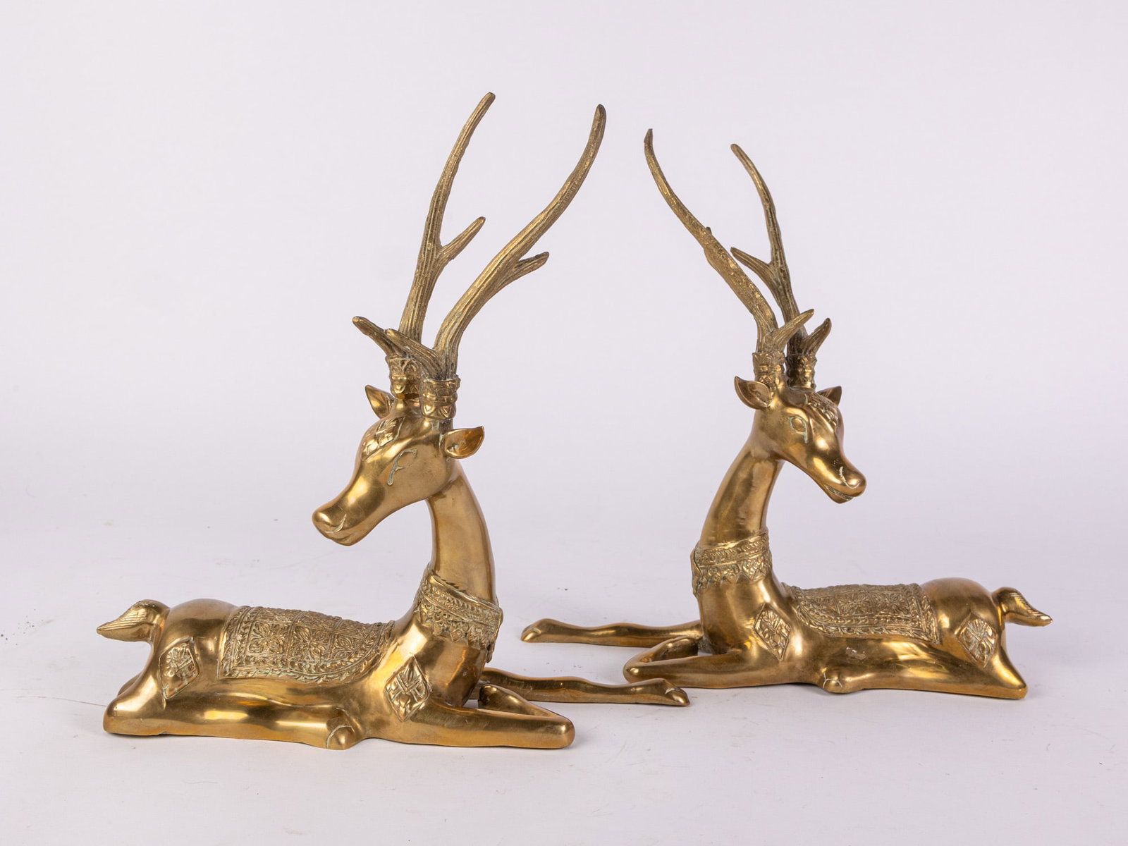Vintage Pair of Sarreid Brass Recumbent Deer: Pair of Sarreid Brass Recumbent Deer Size 13" x 13" x 4" Literature Brooks Auction – Online Auction Terms & Conditions Contact: (856) 694-2960 | info@brooks.auction READ BEFORE YOU BID: