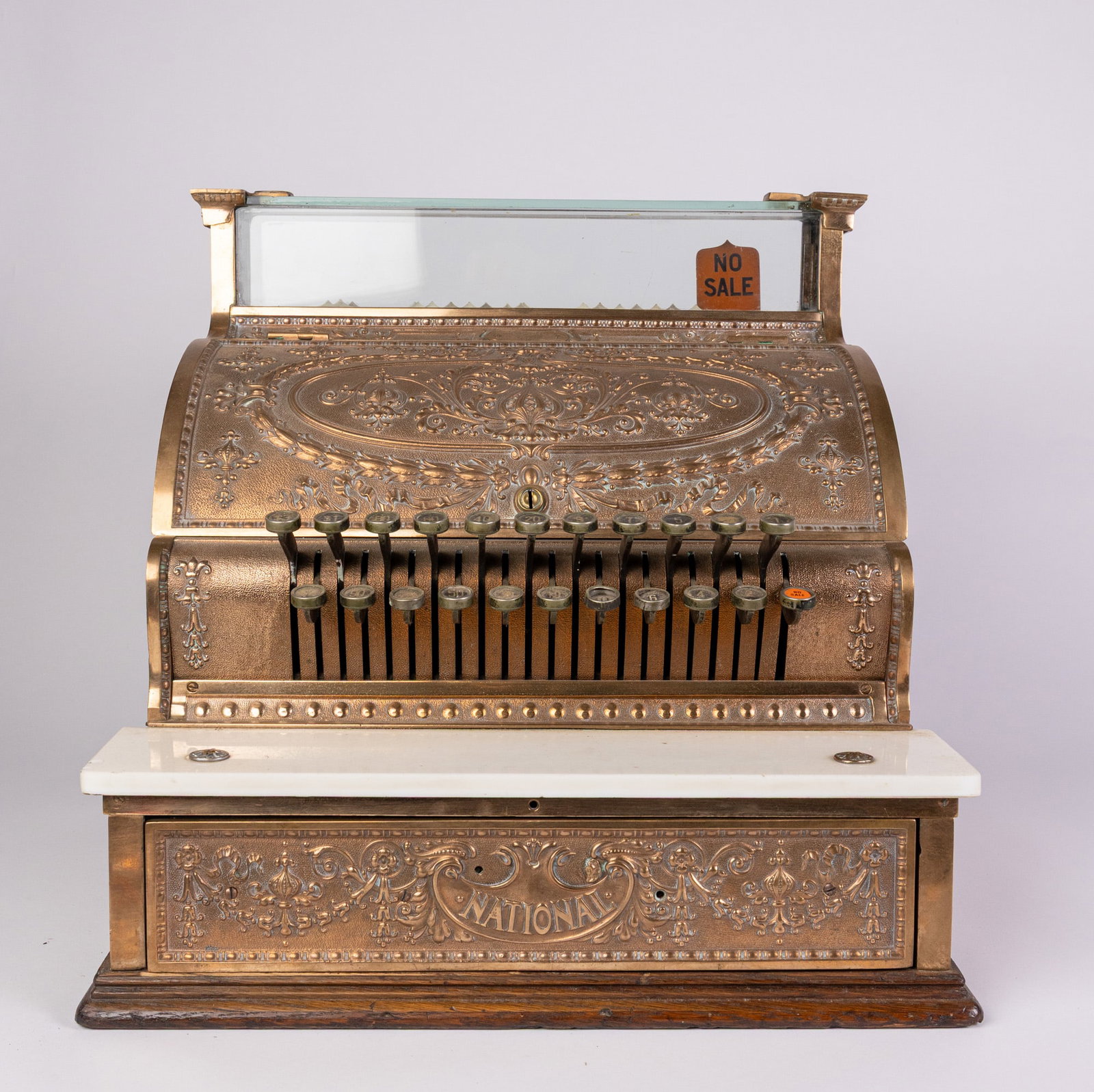 National Cash Register Model 332: National Cash Register Model 332, Serial number 978778, Beautiful ornate brass design and marble detail. Does not include a key. Size 17" x 17" x 15" Literature Brooks Auction – Online Auction