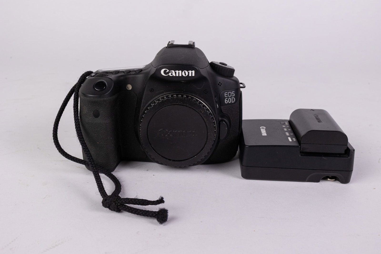 Canon EOS 60D Digital SLR Camera: Canon EOS 60D Digital SLR Camera, tested and powers on! Literature Brooks Auction – Online Auction Terms & Conditions Contact: (856) 694-2960 | info@brooks.auction READ BEFORE YOU BID: We want