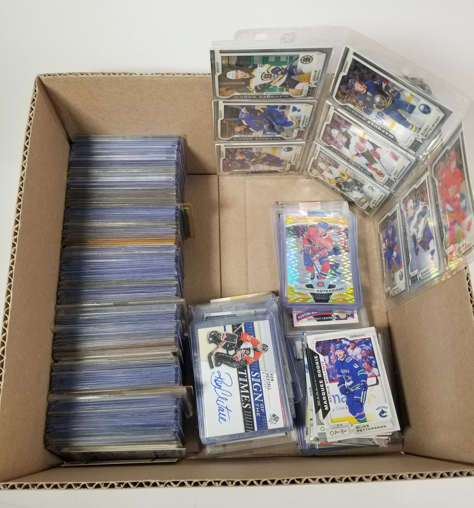 Assortment of Hockey Cards: Assortment of Hockey Cards featuring autographs, relics and graded cards of major stars and legends Size 7" x 12" x 12" Literature Brooks Auction – Online Auction Terms & Conditions Contact: (8