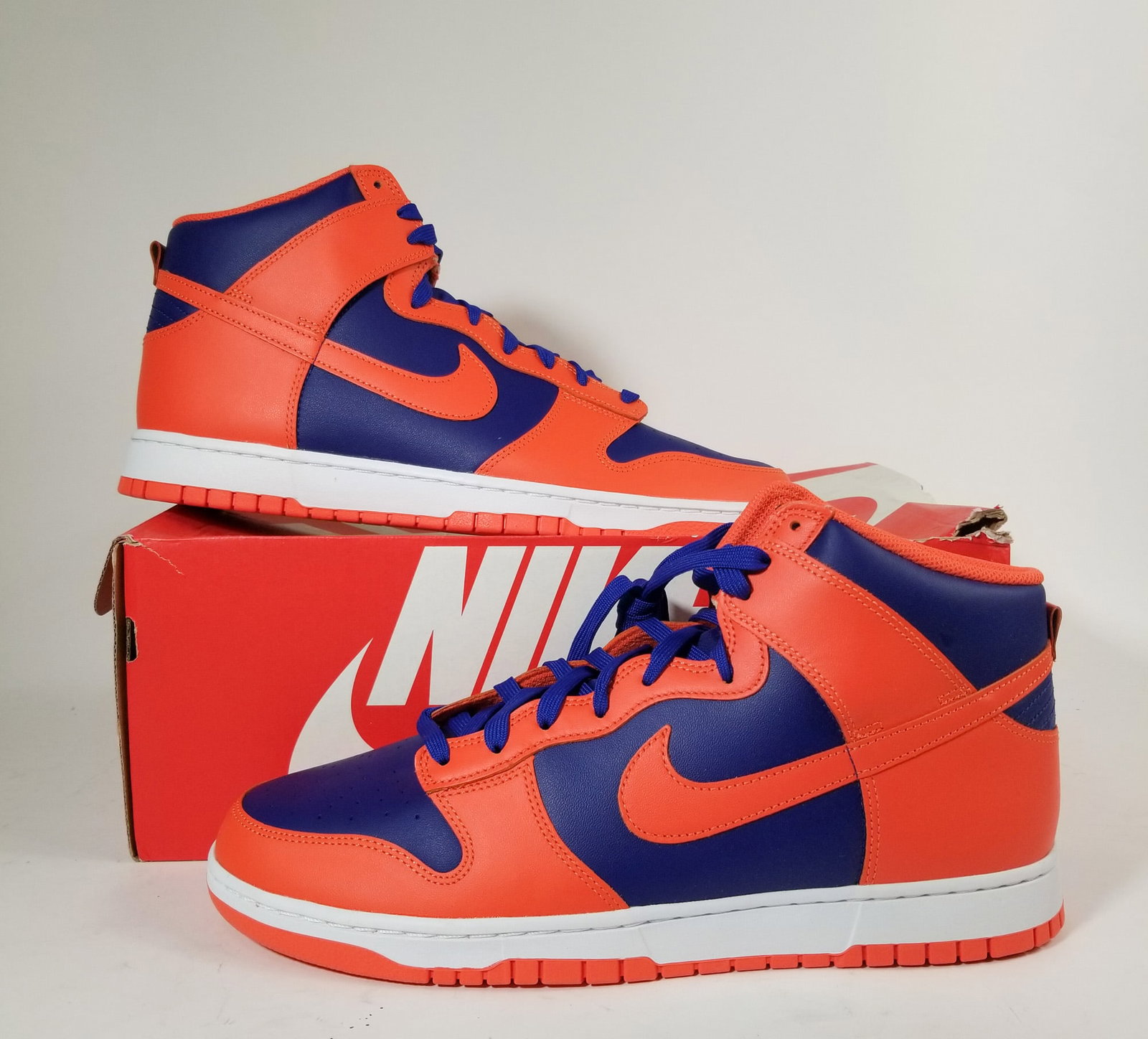 Nike Dunk High Knicks Orange/Deep Royal Blue Sneakers: Nike Dunk High Knicks Orange/Deep Royal Blue Sneakers: Appear to be clean and unworn. Men's size 14. Includes original box. "From original product description: "The Nike Dunk High Knicks are a high-to