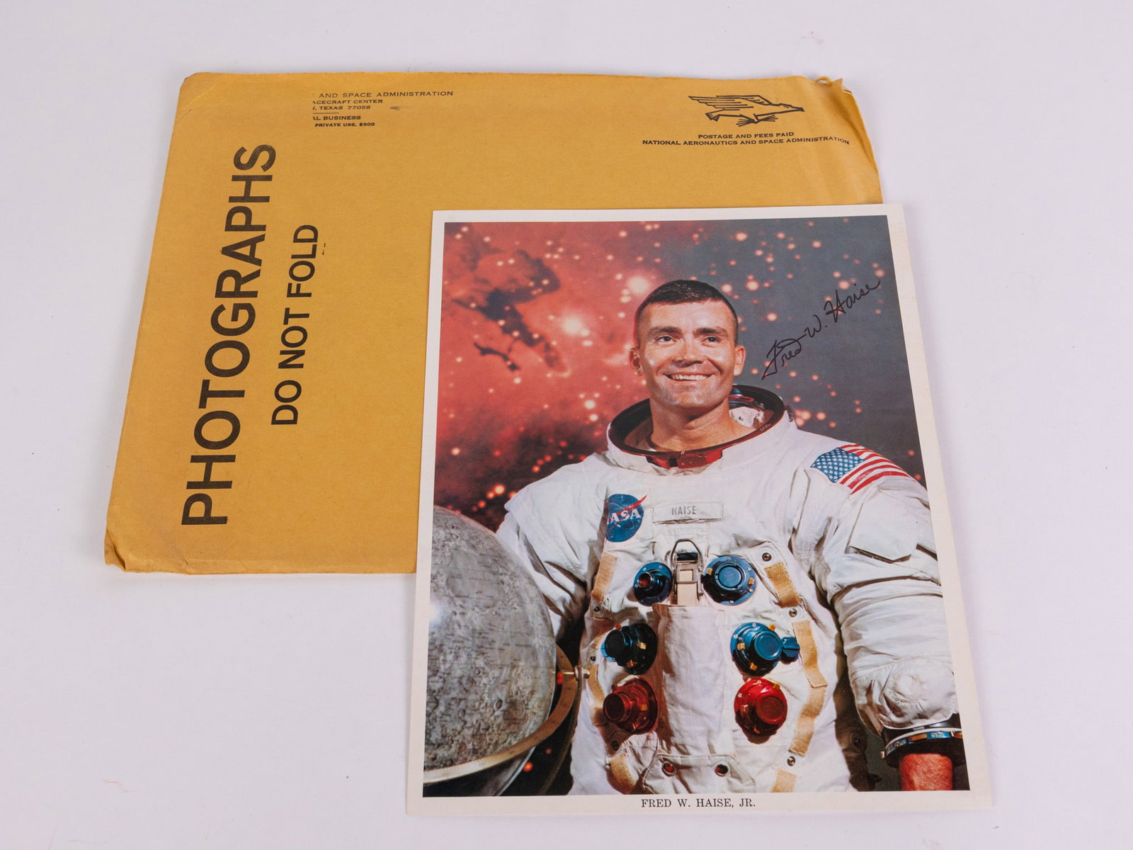 Autographed Photo of Astronaut Fred W. Haise, Jr.: Autographed Photo of Astronaut Fred W. Haise, Jr., From a curated private collection that was amassed through personal correspondence, this signed photograph was sent direct from N.A.S.A. to the