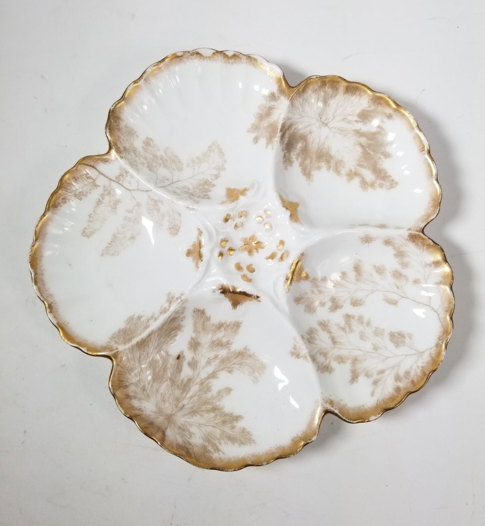 Antique French Porcelain Five Well Oyster Plate: Antique French Porcelain Five Well Oyster Plate Size 8" diameter Literature Brooks Auction – Online Auction Terms & Conditions Contact: (856) 694-2960 | info@brooks.auction READ BEFORE YOU BID: