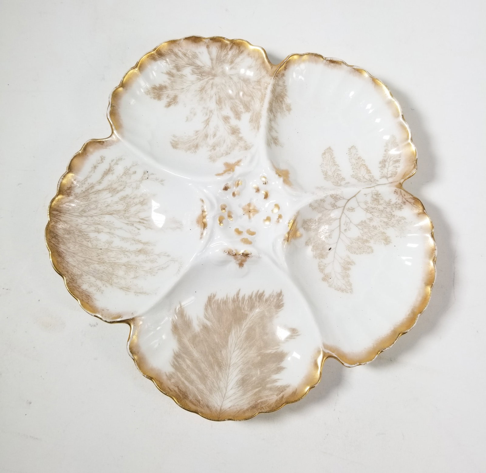 Antique French Porcelain Five Well Oyster Plate: Antique French Porcelain Five Well Oyster Plate Size 8" diameter Literature Brooks Auction – Online Auction Terms & Conditions Contact: (856) 694-2960 | info@brooks.auction READ BEFORE YOU BID: