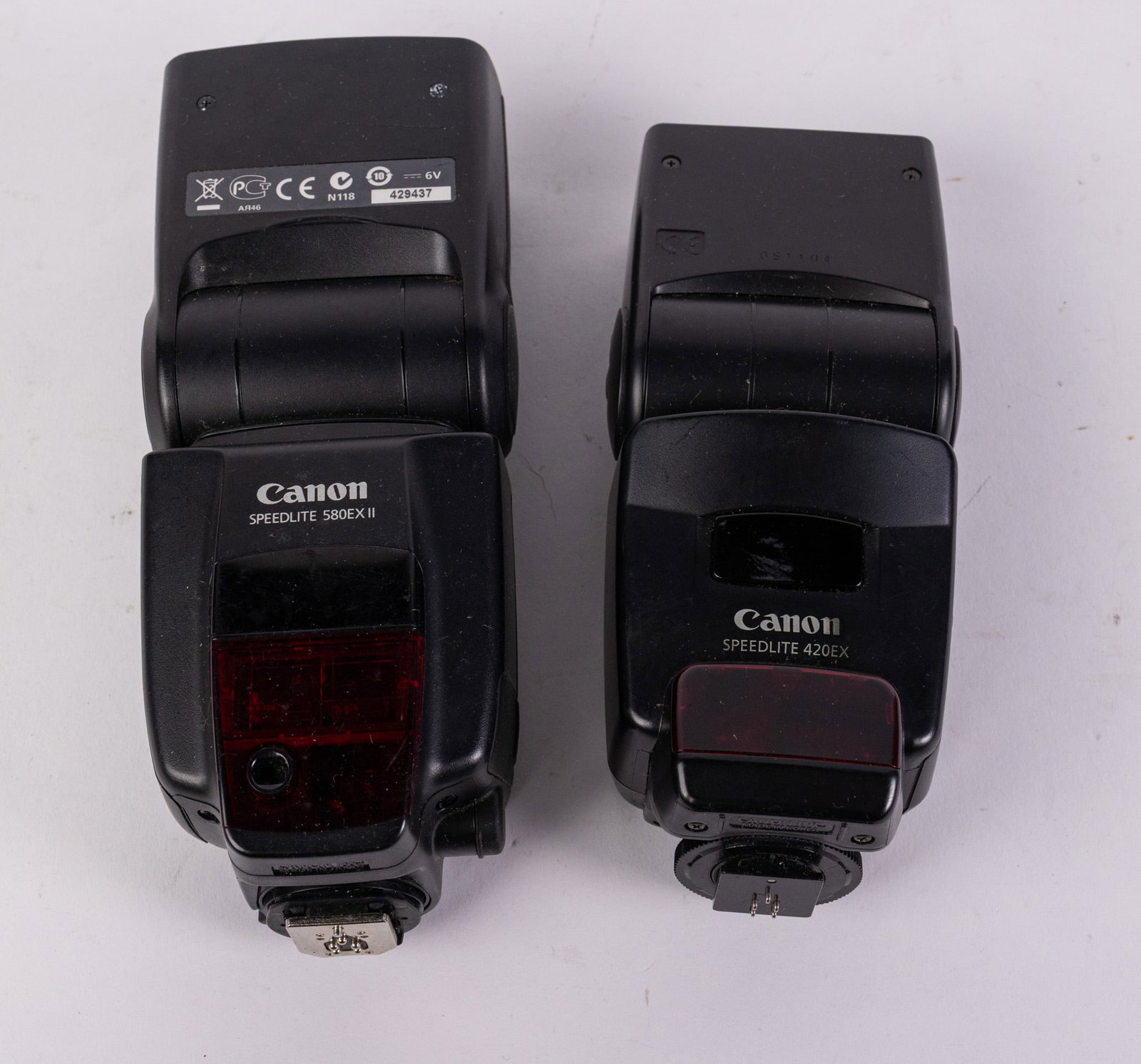 Two Canon Flashes: Two Canon Flashes: Canon Speedlite 580EX II - Canon Speedlite 420EX Size 7" x 12" x 12" Literature Brooks Auction – Online Auction Terms & Conditions Contact: (856) 694-2960 |