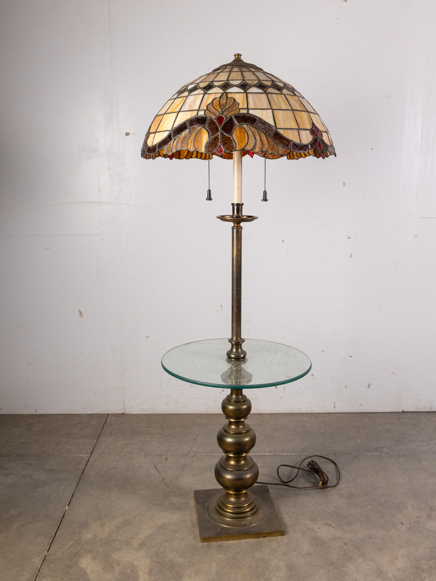 Floor Lamp with Table and Leaded Glass Shade: Floor Lamp with Table and Leaded Glass Shade, base is signed Stiffel Size 54" x 22" diameter Literature Brooks Auction – Online Auction Terms & Conditions Contact: (856) 694-2960 |
