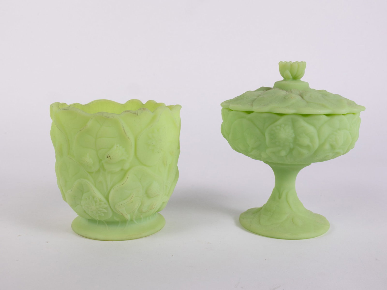Two Pieces of Fenton "Lily" Uranium Satin Custard Glass: Two Pieces of Fenton "Lily" Uranium Satin Custard Glass Size 8" x 7" x 7" Literature Brooks Auction – Online Auction Terms & Conditions Contact: (856) 694-2960 | info@brooks.auction READ BEFORE