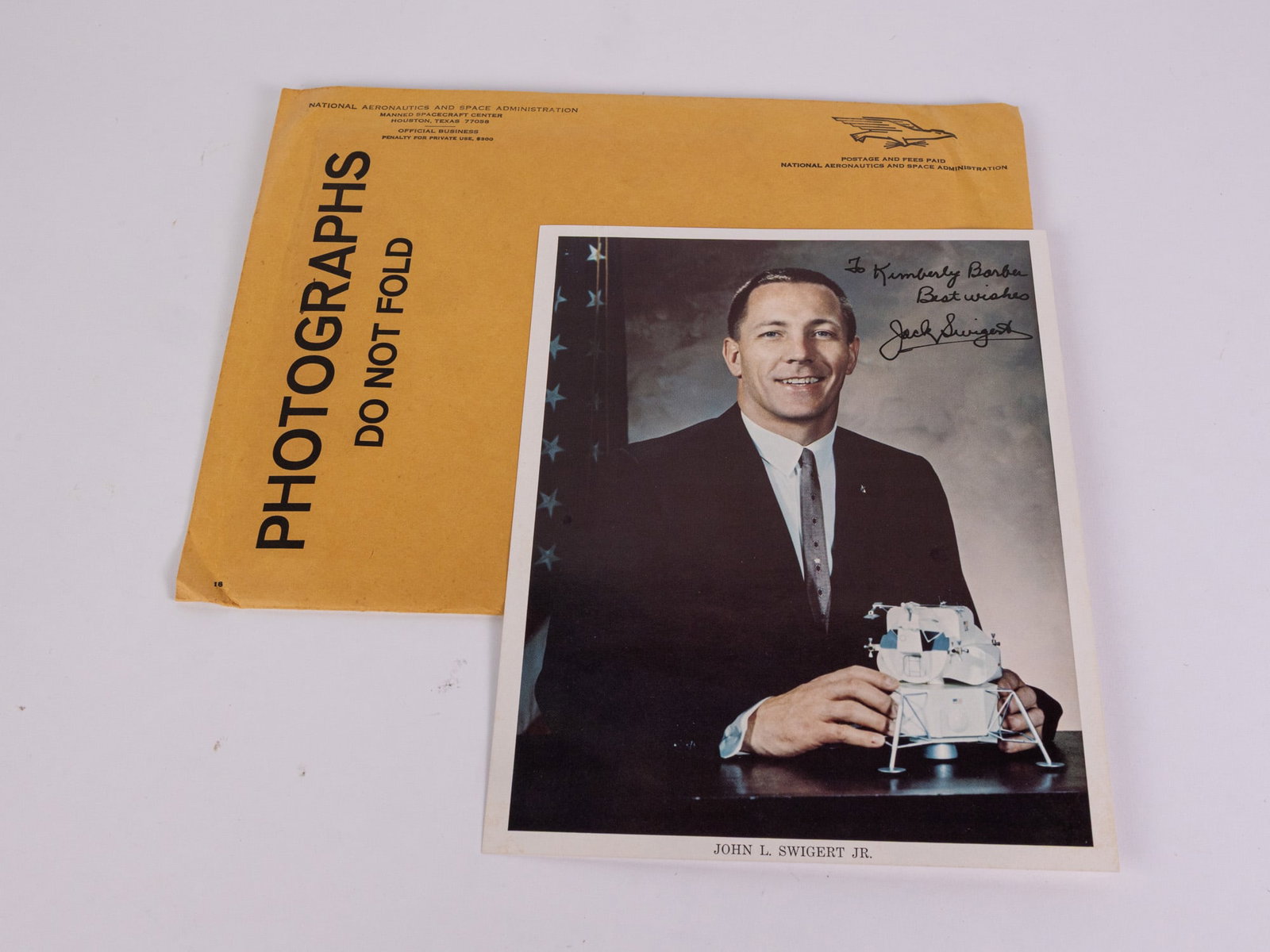 Autographed Photograph of Astronaut John L. Swigert Jr.: Autographed Photograph of Astronaut John L. Swigert Jr., From a curated private collection that was amassed through personal correspondence, this signed photograph was sent direct from N.A.S.A. to