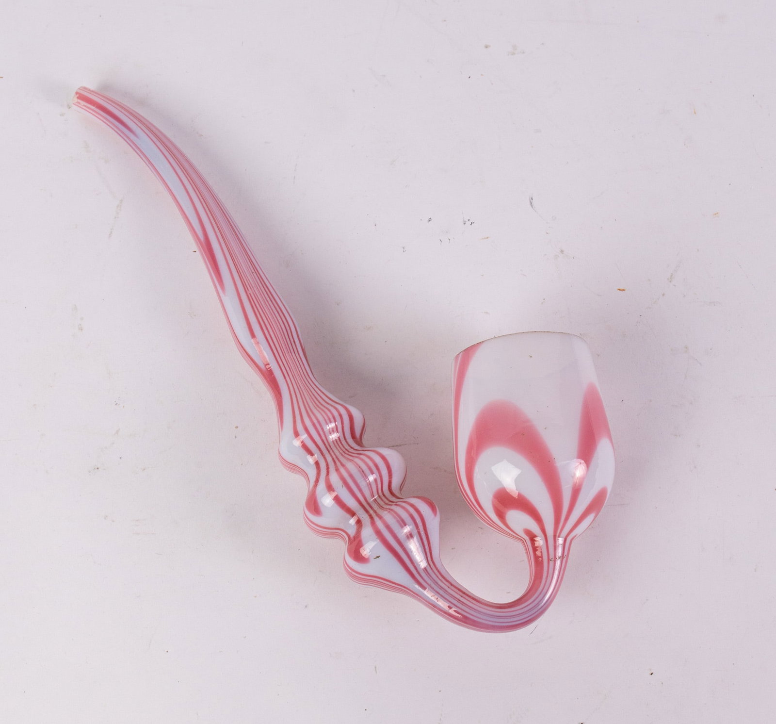 Large Whimsy Blown Glass Pipe: Large Whimsy Blown Glass Pipe, pink and white swirl design Size 12" H Literature Brooks Auction – Online Auction Terms & Conditions Contact: (856) 694-2960 | info@brooks.auction READ BEFORE YOU