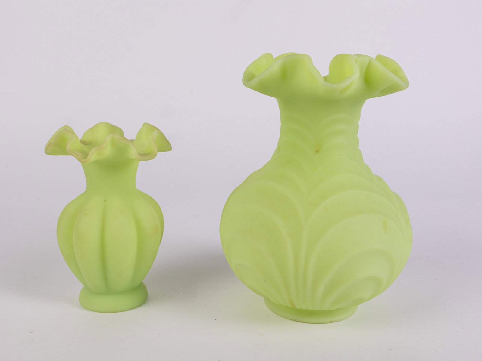 Pair of Fenton Uranium Satin Custard Glass Vases ft Drapery Pattern: Pair of Fenton Uranium Satin Custard Glass Vases ft Drapery Pattern Size 8" x 7" x 7" Literature Brooks Auction – Online Auction Terms & Conditions Contact: (856) 694-2960 | info@brooks.auction