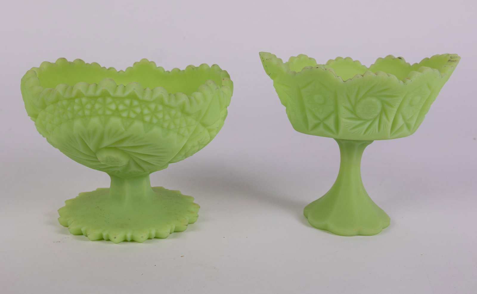 Pair of Fenton Uranium Satin Custard Glass Compotes ft Pinwheel Pattern: Pair of Fenton Uranium Satin Custard Glass Compotes ft Pinwheel Pattern Size 5" x 6.5" x 6.5" Literature Brooks Auction – Online Auction Terms & Conditions Contact: (856) 694-2960 | info@brooks