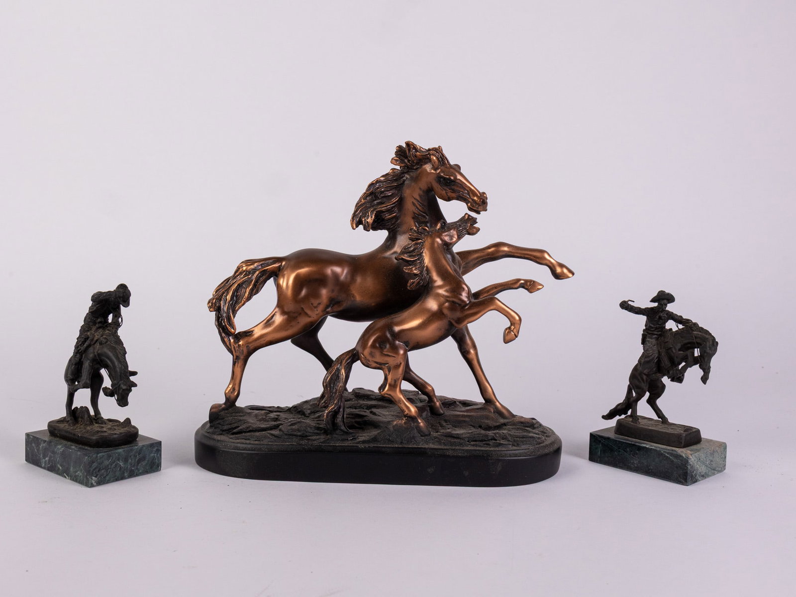Trio of Sculptures ft . Pair of Bronze Miniature Remington Reproductions: Trio of Sculptures ft . Pair of Bronze Miniature Remington Reproductions Size 7" x 12" x 12" Literature Brooks Auction – Online Auction Terms & Conditions Contact: (856) 694-2960 | info@brooks.