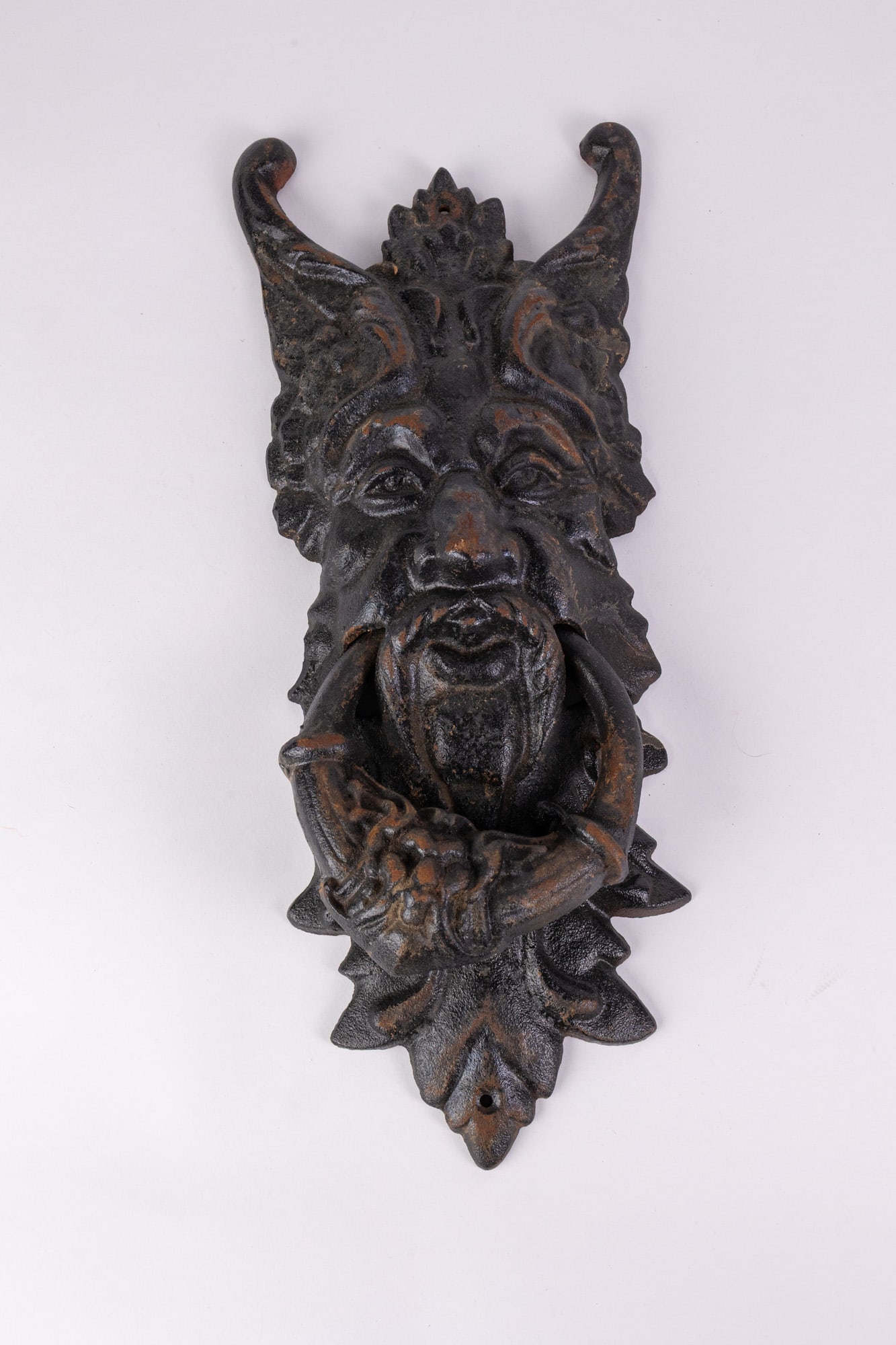Large Cast Iron Figural Door Knocker: Large Cast Iron Figural Door Knocker Size 19" x 3" x 8" Literature Brooks Auction – Online Auction Terms & Conditions Contact: (856) 694-2960 | info@brooks.auction READ BEFORE YOU BID: We want