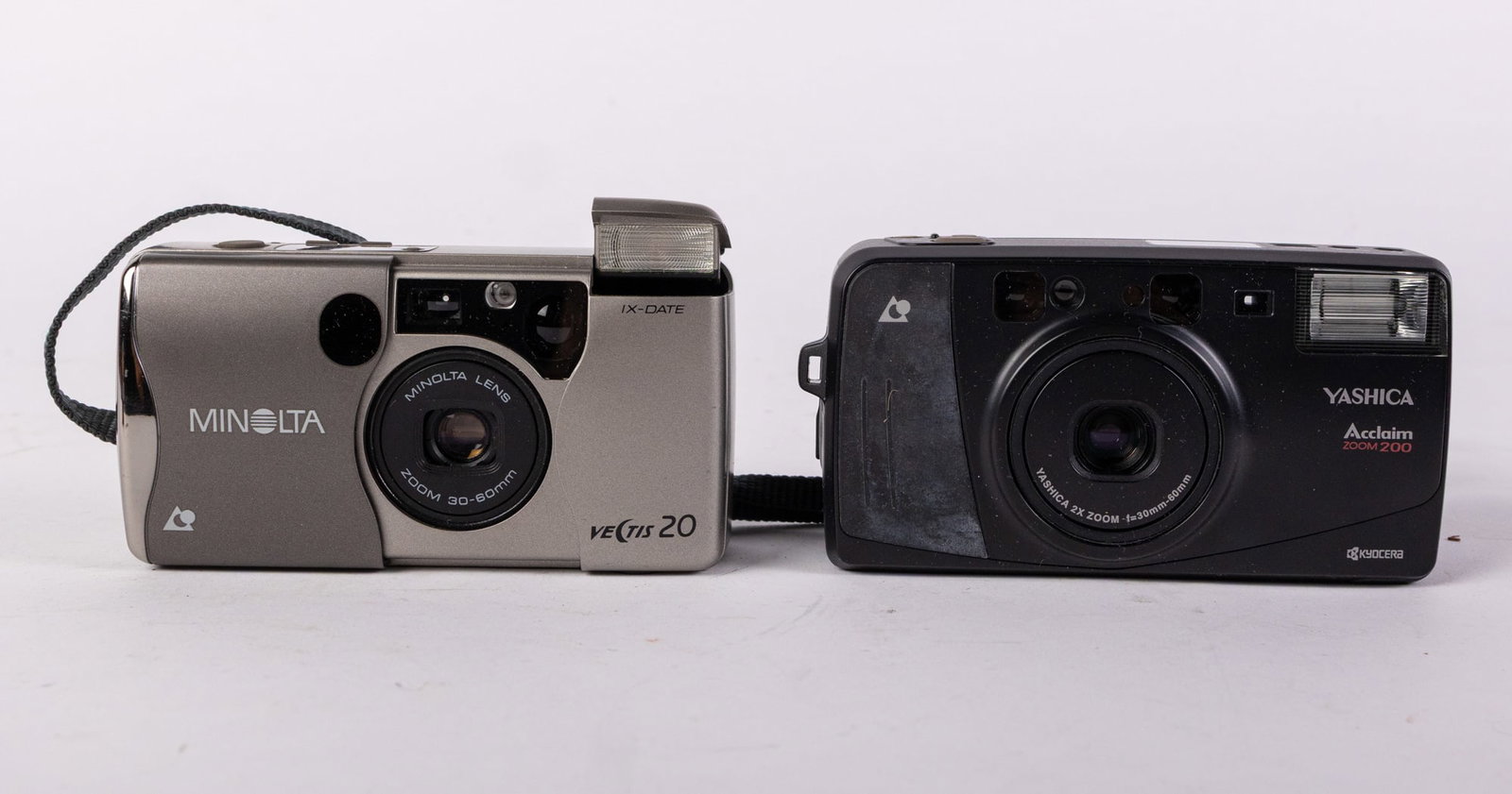 Two Vintage Point and Shoot Cameras: Two Vintage Point and Shoot Cameras: Minolta Vectis 20 - Yashica Acclaim Zoom 200 Literature Brooks Auction – Online Auction Terms & Conditions Contact: (856) 694-2960 | info@brooks.auction READ