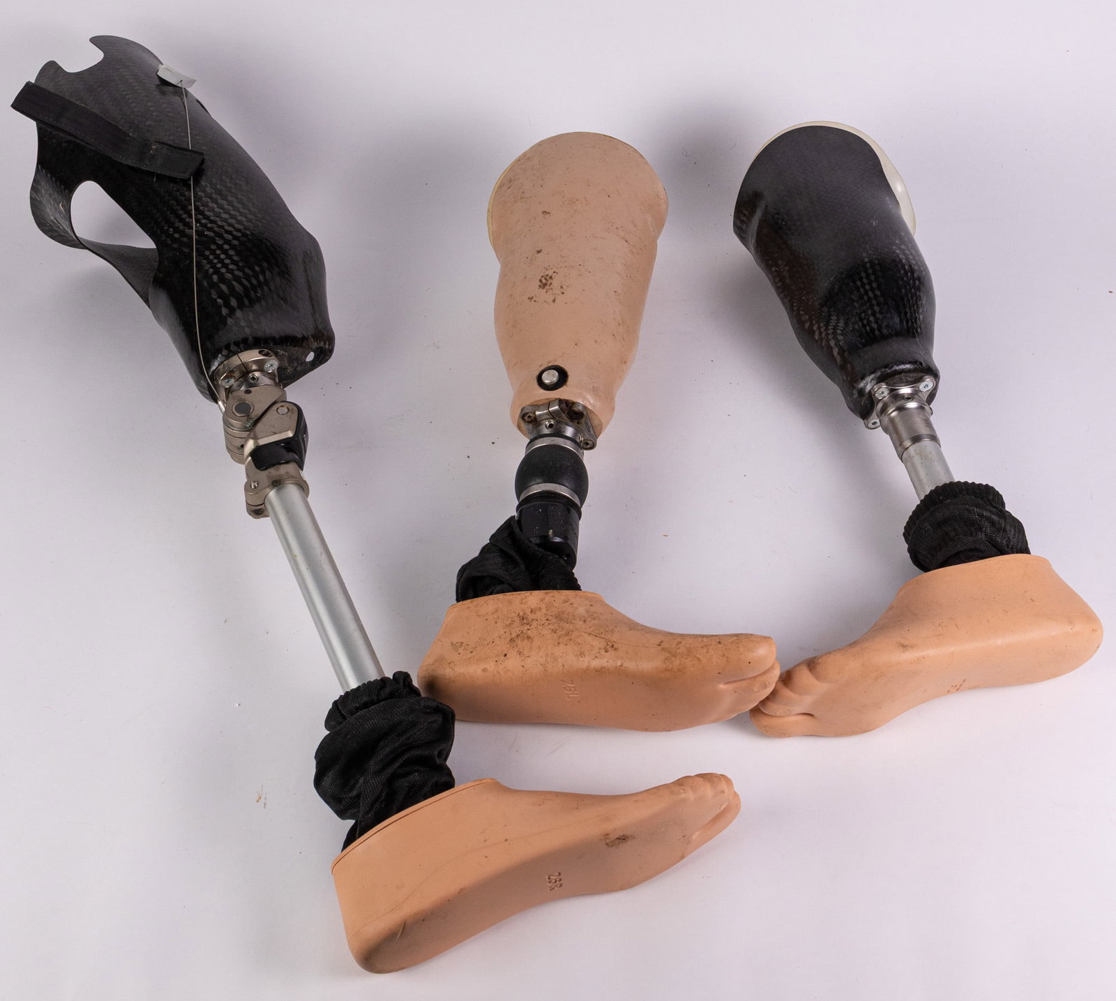Three Prosthetic Legs: Three Prosthetic Legs Size 34" H Literature Brooks Auction – Online Auction Terms & Conditions Contact: (856) 694-2960 | info@brooks.auction READ BEFORE YOU BID: We want you to feel confident