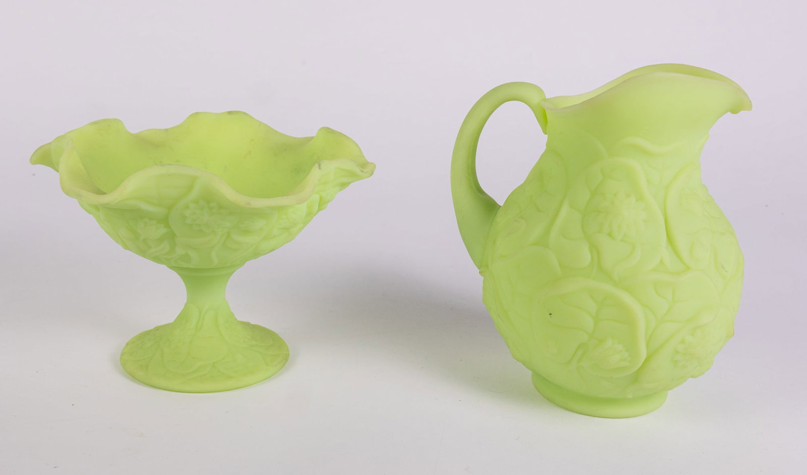 Two Pieces of Fenton "Lily" Uranium Satin Custard Glass: Two Pieces of Fenton "Lily" Uranium Satin Custard Glass Size 6" x 7" x 7" Literature Brooks Auction – Online Auction Terms & Conditions Contact: (856) 694-2960 | info@brooks.auction READ BEFORE