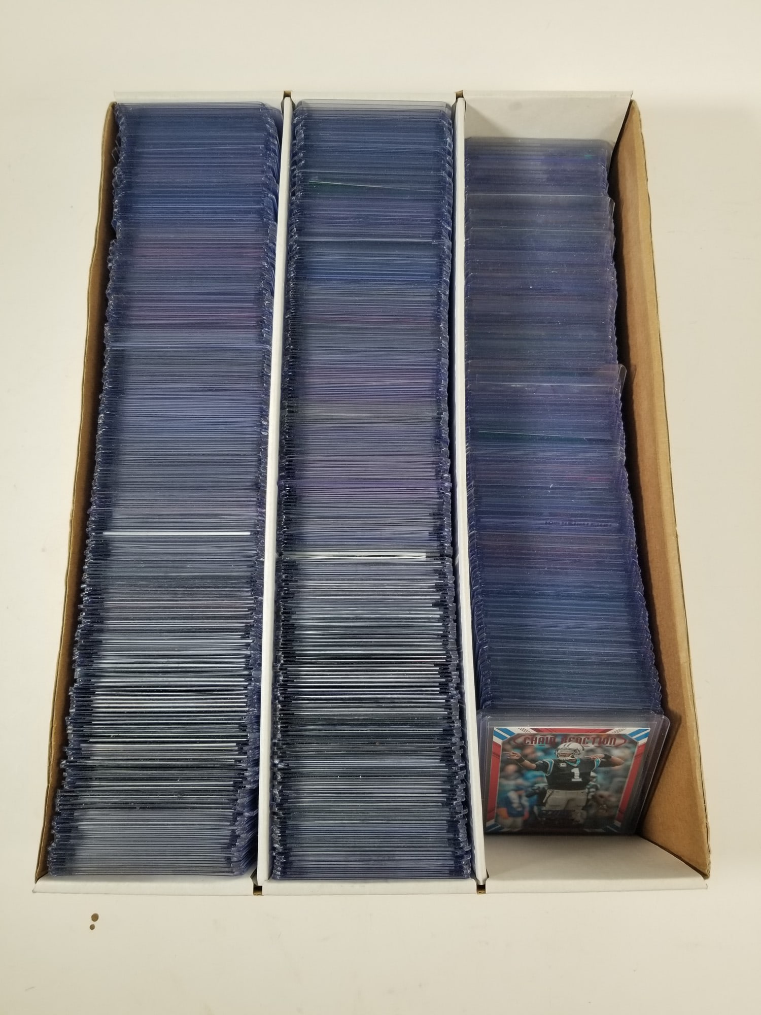 Assortment of Modern Football Insert and Parallel Cards: Assortment of Modern Football Insert and Parallel Cards featuring numbered cards of rookies, legends, and major stars. Size 14.5" x 10" x 4" Literature Brooks Auction – Online Auction Terms &
