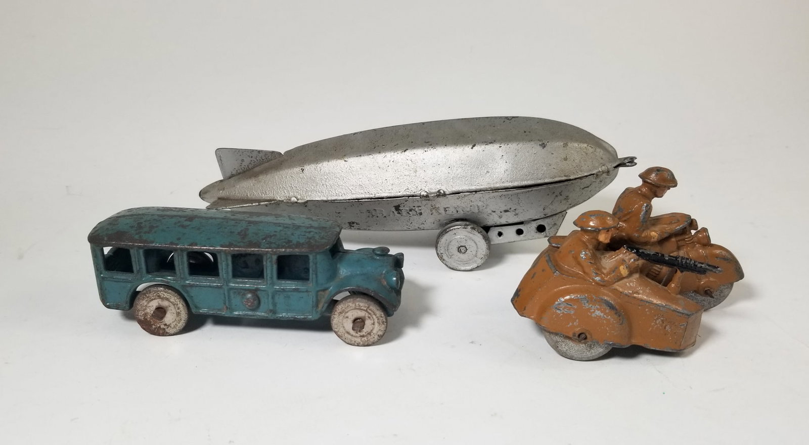 Three Vintage Toy Vehicles (1 of 5)