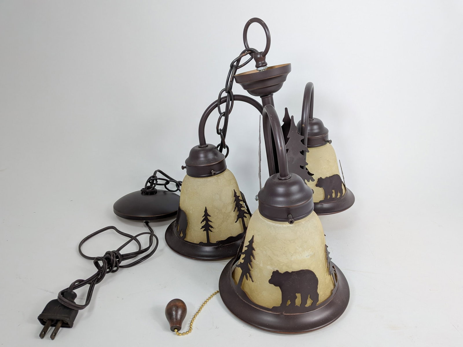 Three Light Chandelier with Country Silhouette Motif: Three Light Chandelier with Country Silhouette Motif Size 12" H Literature Brooks Auction – Online Auction Terms & Conditions Contact: (856) 694-2960 | info@brooks.auction READ BEFORE YOU BID:
