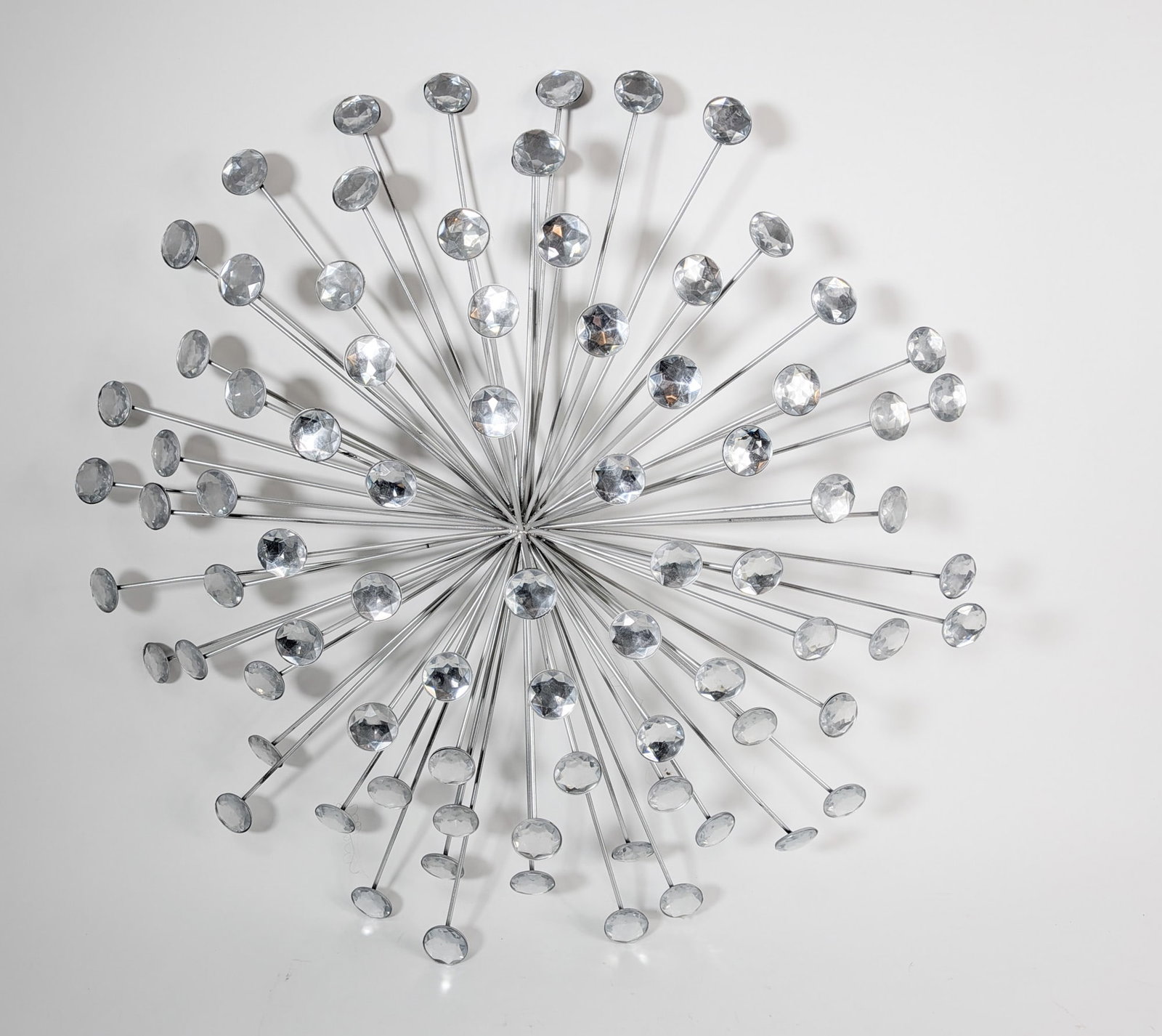 Mid Century Modern Style Starburst Wall Decor: Mid Century Modern Style Starburst Wall Decor Size 26" diameter Literature Brooks Auction – Online Auction Terms & Conditions Contact: (856) 694-2960 | info@brooks.auction READ BEFORE YOU BID: