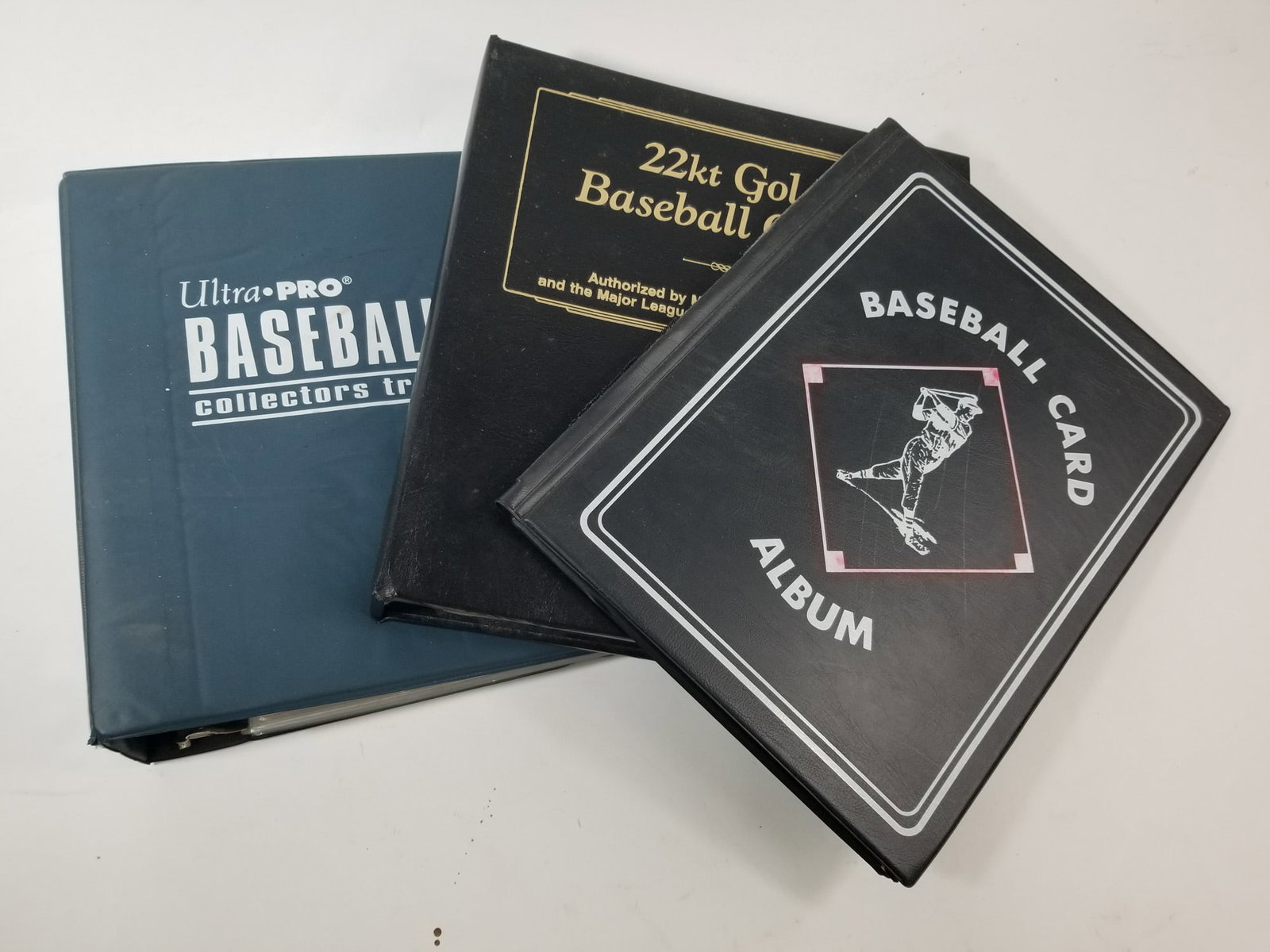 Three Sports Card Binders: Three Sports Card Binders featuring rookie cards of Jeff Bagwell, Sammy Sosa, Frank Thomas and Andrew McCutchen along with numbered and relic cards. Size 7" x 12" x 12" Literature Brooks Auction
