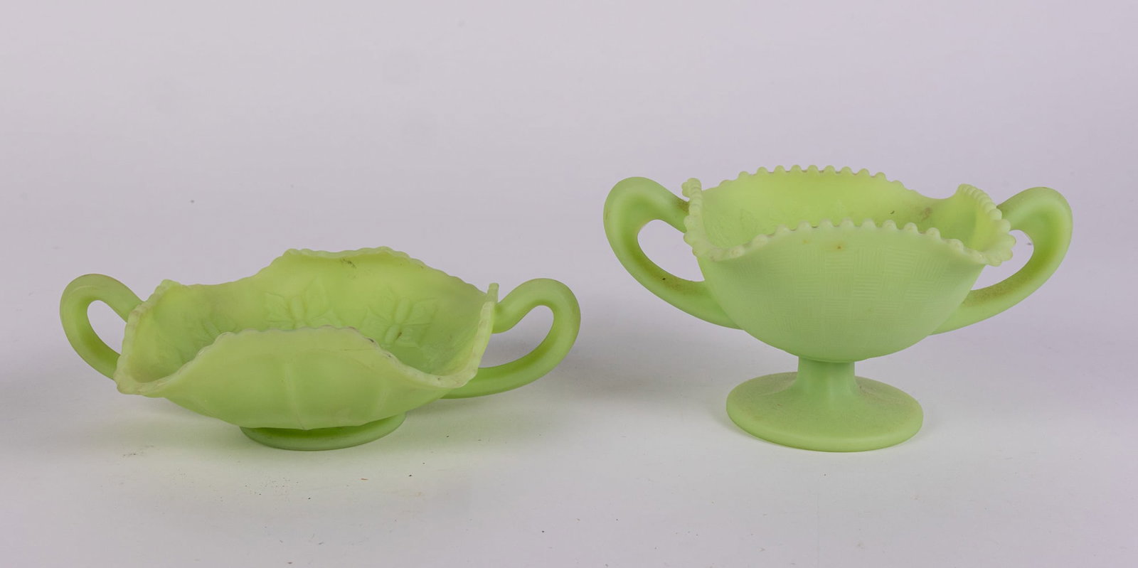 Two Pieces of Fenton Uranium Satin Custard Art Glass: Two Pieces of Fenton Uranium Satin Custard Art Glass Size 4" x 8" x 5" Literature Brooks Auction – Online Auction Terms & Conditions Contact: (856) 694-2960 | info@brooks.auction READ BEFORE