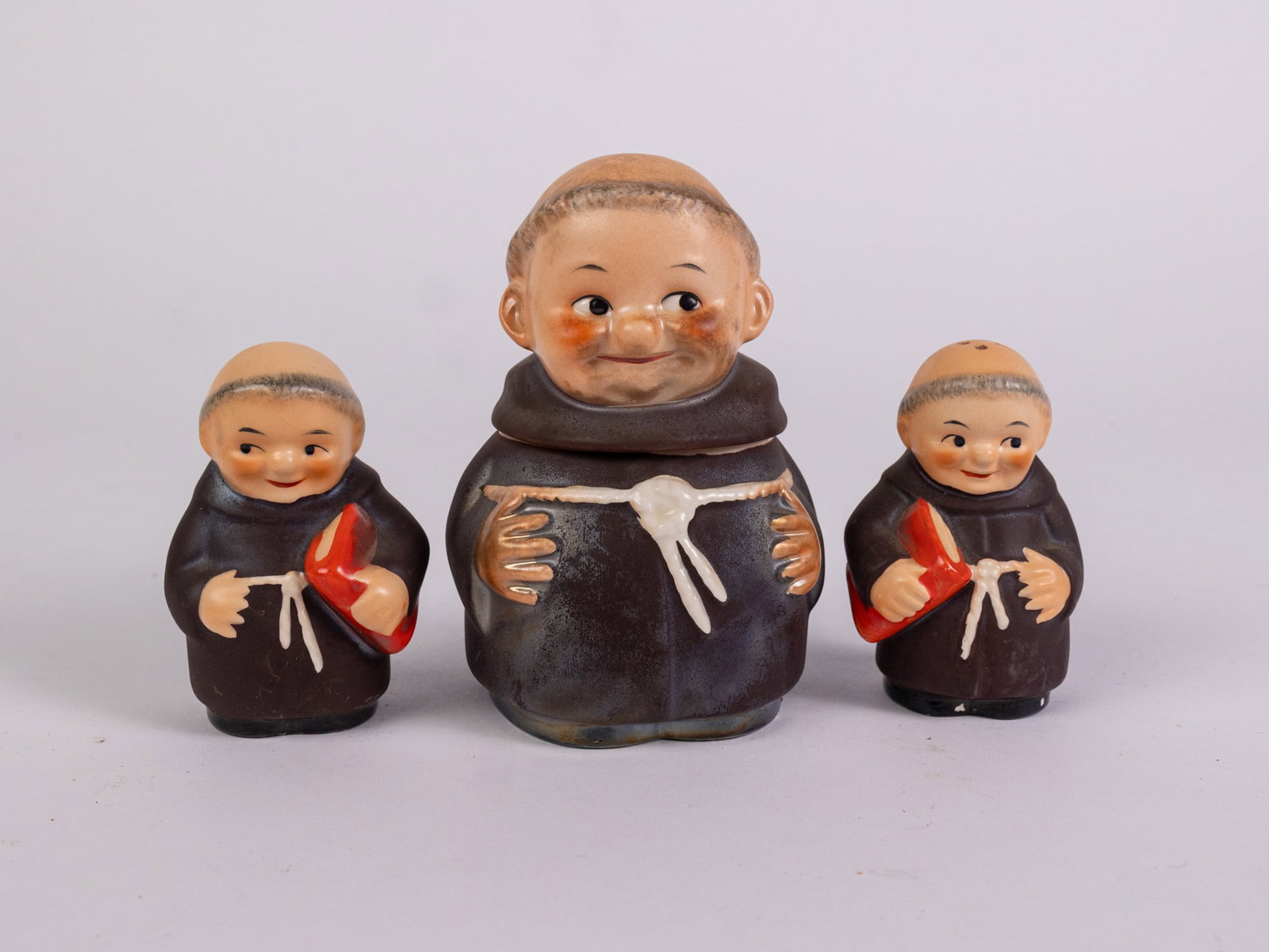 Trio of Goebel Friar Tuck Items: Trio of Goebel Friar Tuck Items Size 7" x 12" x 12" Literature Brooks Auction – Online Auction Terms & Conditions Contact: (856) 694-2960 | info@brooks.auction READ BEFORE YOU BID: We want you