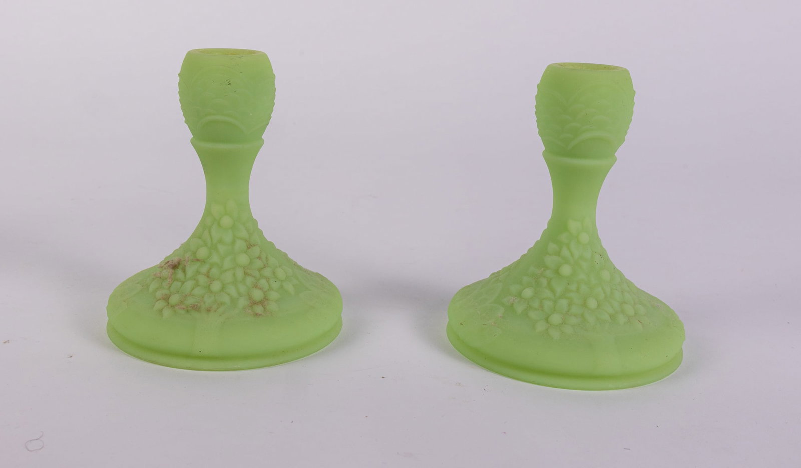 Pair of Fenton Uranium Satin Custard Glass Candle Holders: Pair of Fenton Uranium Satin Custard Glass Candle Holders Size 5" x 4" x 4" Literature Brooks Auction – Online Auction Terms & Conditions Contact: (856) 694-2960 | info@brooks.auction READ
