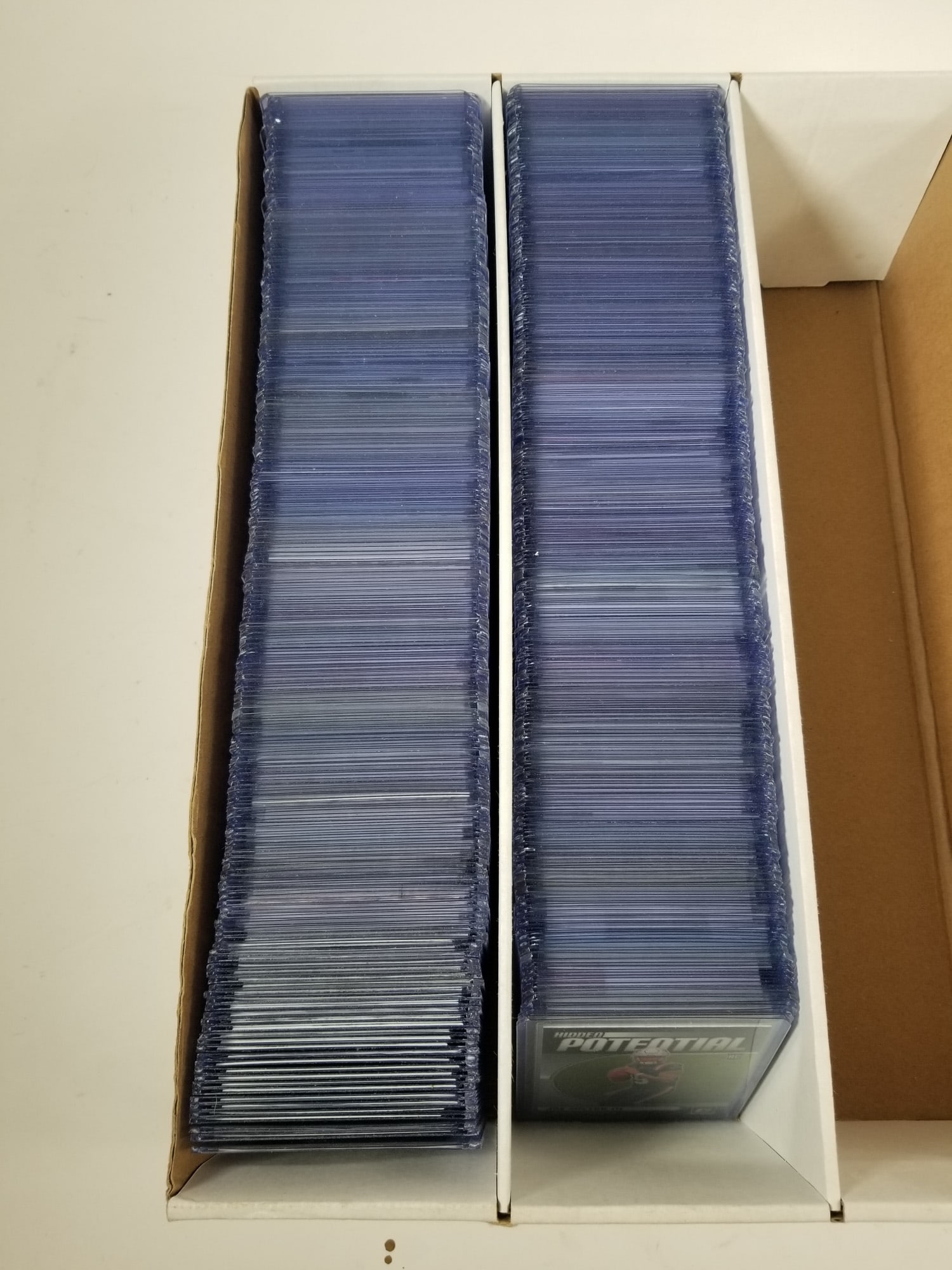 Assortment of Modern Football Rookie and Insert Cards: Assortment of Modern Football Rookie and Insert Cards featuring Cooper DeJean, Micah Parsons, Michael Penix Jr. and Bijan Robinson. Size 14.5" x 10" x 4" Literature Brooks Auction – Online