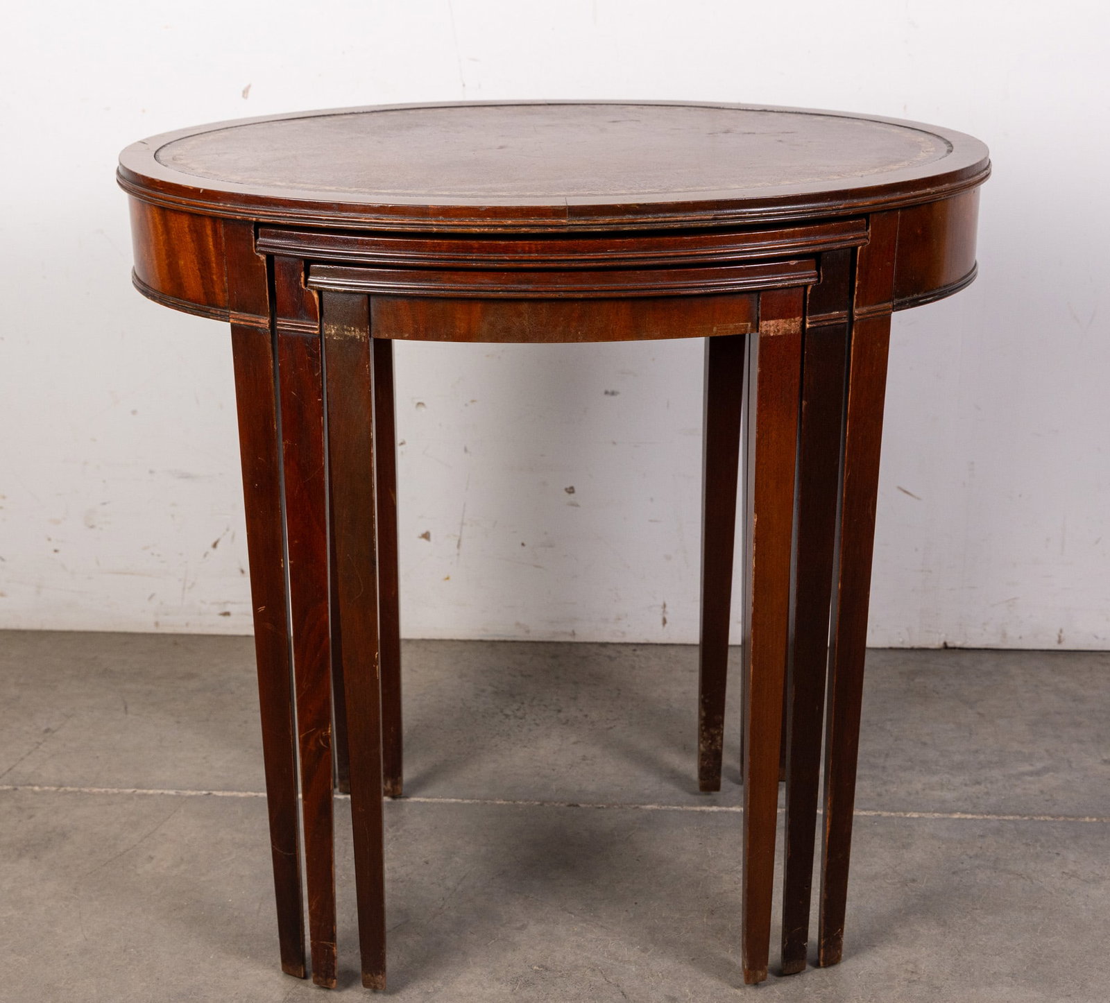 Vintage Set of Nesting Table w/ Leather Top & Gilded Accents: Vintage Set of Nesting Table w/ Leather Top & Gilded Accents Size 25" x 26" x 18" Literature Brooks Auction – Online Auction Terms & Conditions Contact: (856) 694-2960 | info@brooks.auction