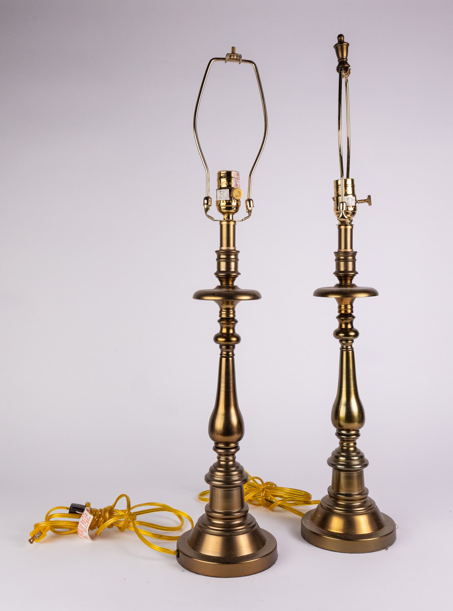 Pair of Vintage Brass-Toned Decorative Table Lamps: Pair of Vintage Brass-Toned Decorative Table Lamps Size 30" H Literature Brooks Auction – Online Auction Terms & Conditions Contact: (856) 694-2960 | info@brooks.auction READ BEFORE YOU BID: