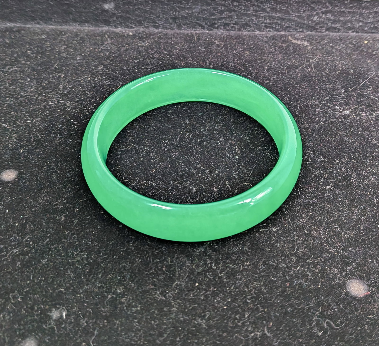 Apple Green Jade Bangle: Apple Green Jade Bangle inner diameter 2 1/5" or 64mm Literature Brooks Auction – Online Auction Terms & Conditions Contact: (856) 694-2960 | info@brooks.auction READ BEFORE YOU BID: We want