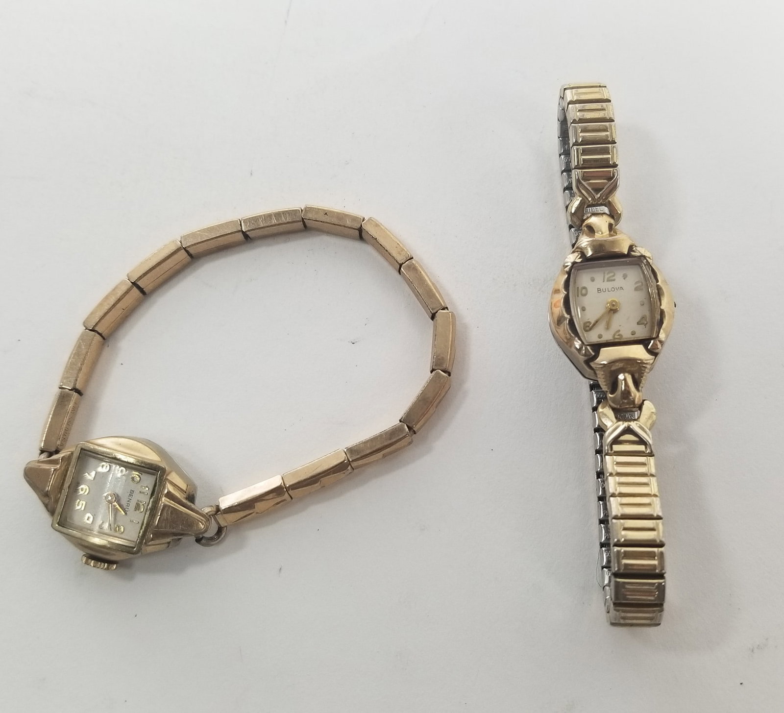 Two Vintage 10k Rolled Gold Womens Watches: Two Vintage 10k Rolled Gold Womens Watches (1) Bulova - (1)Benrus Literature Brooks Auction – Online Auction Terms & Conditions Contact: (856) 694-2960 | info@brooks.auction READ BEFORE YOU