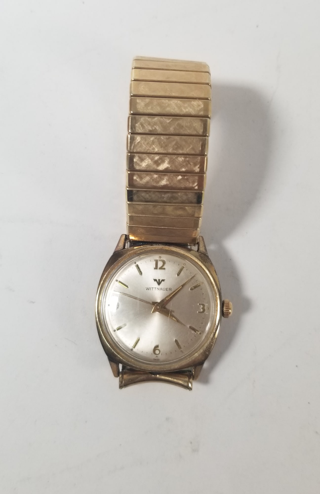 *RUNNING* Wittnauer Manual 1950s "Revue" Tank Wrist Watch: Wittnauer Manual 1950s "Revue" Tank Wrist Watch marked "10k Gold Filled" Literature Brooks Auction – Online Auction Terms & Conditions Contact: (856) 694-2960 | info@brooks.auction READ BEFORE
