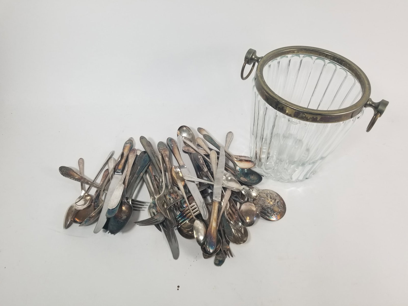 International Silver Plated Silverware in Glass Champagne Bucket: International Silver Plated Silverware in Glass Champagne Bucket Literature Brooks Auction – Online Auction Terms & Conditions Contact: (856) 694-2960 | info@brooks.auction READ BEFORE YOU BID: