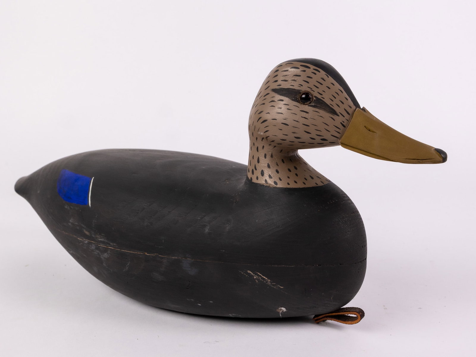 Jim Gale (1899 - 1971) Brigantine, NJ | Black Duck Hen Decoy: The base has an applied lead weight which is marked "J A GALE BRTG N.J.". Featuring glass inset eyes & hand painted detailing Size 7.5" x 6" x 16" Literature Brooks Auction – Online Auction Term