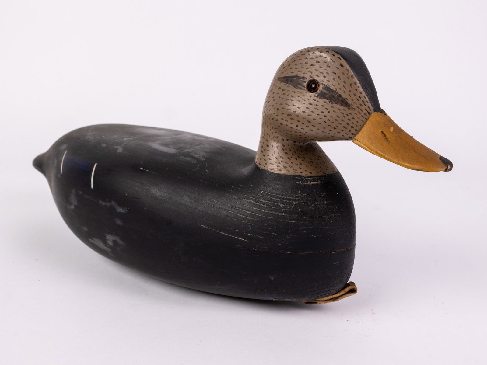 Jim Gale (1899 - 1971) Brigantine, NJ | Black Duck Drake Decoy: The base has an applied lead weight which is marked "J A GALE". Featuring glass inset eyes & hand painted detailing Size 8" x 6" x 16" Literature Brooks Auction – Online Auction Terms & Conditio