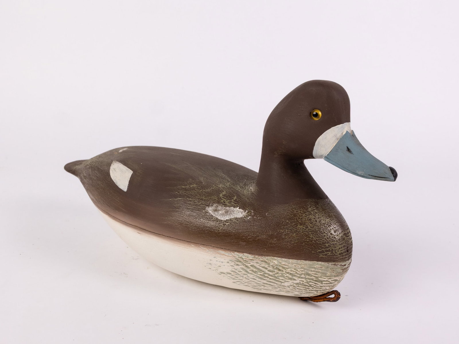 Jim Gale (1899 - 1971) Brigantine, NJ | Bluebill Hen Duck Decoy: Also known as a Scaup decoy. The base has an applied lead weight which is marked "J A GALE". Featuring glass inset eyes & hand painted detailing. Size 7" x 6" x 14" Literature Brooks Auction – O