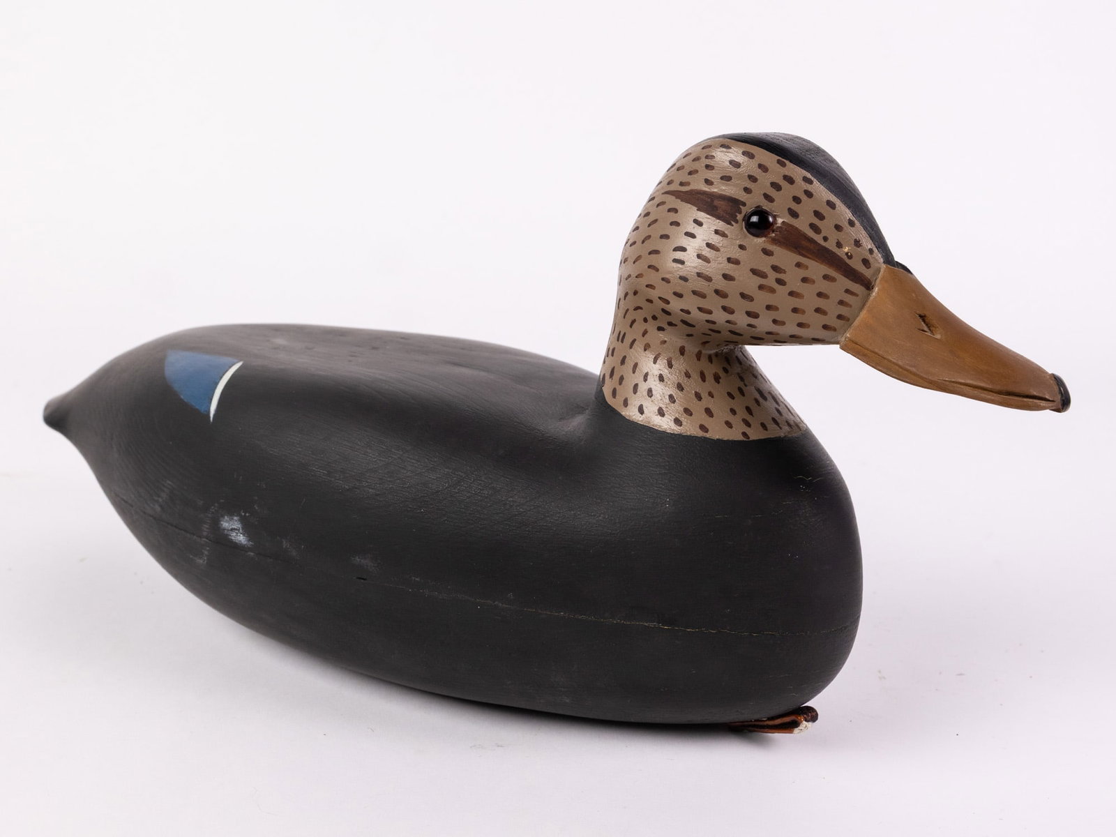 Jim Gale (1899 - 1971) Brigantine, NJ | Black Duck Hen Decoy: The base has an applied lead weight which is marked "J A GALE". Featuring glass inset eyes & hand painted detailing Size 7" x 6" x 16" Literature Brooks Auction – Online Auction Terms &