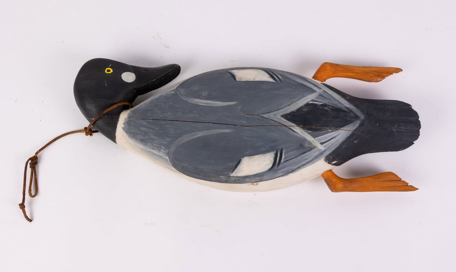Jim Gale (1899 - 1971) Brigantine, NJ | "Dead Duck" Wall Mounted Decoy: Carved wooden duck by decoy carver Jim Gale. Signed on reverse. Size 16" x 6" x 2" Literature Brooks Auction – Online Auction Terms & Conditions Contact: (856) 694-2960 | info@brooks.auction