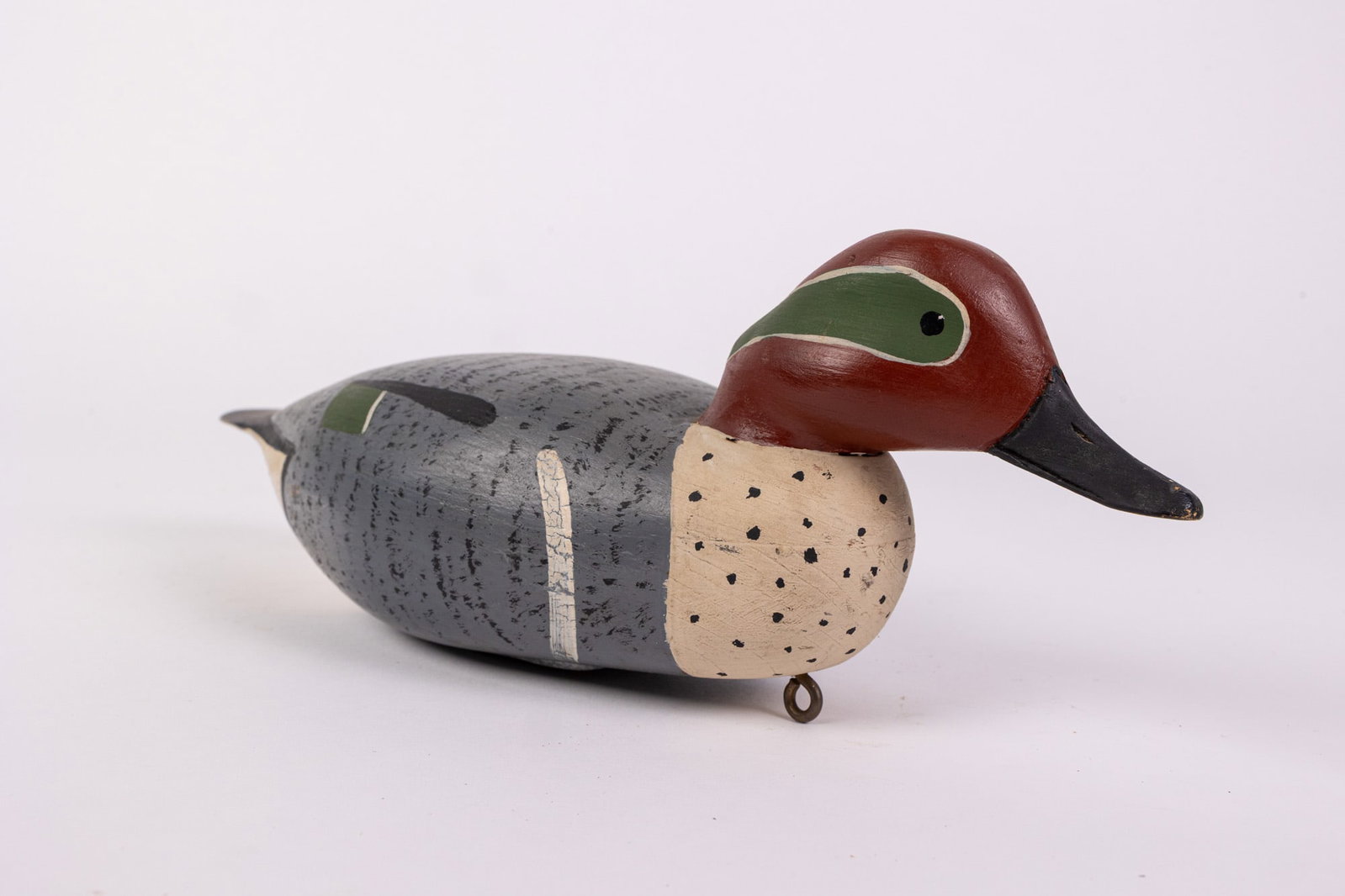 Vintage Green-Winged Teal Drake Duck Decoy: Unsigned, lead weighted & featuring high quality hand painted detail. Size 4" x 4" x 13" Literature Brooks Auction – Online Auction Terms & Conditions Contact: (856) 694-2960 |