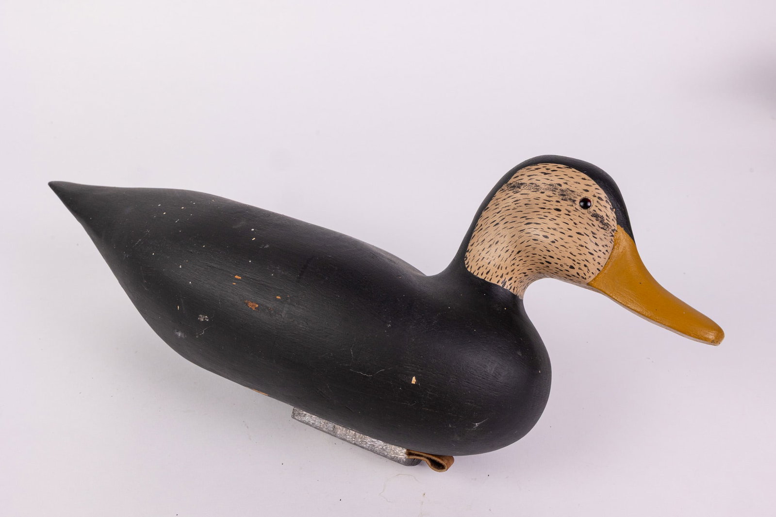 Vintage Hand Carved American Black Duck Hen Decoy: Unsigned, w/ glass eyes, lead weighted & featuring high quality hand painted detail. Size 8" x 6" x 17" Literature Brooks Auction – Online Auction Terms & Conditions Contact: (856) 694-2960 |