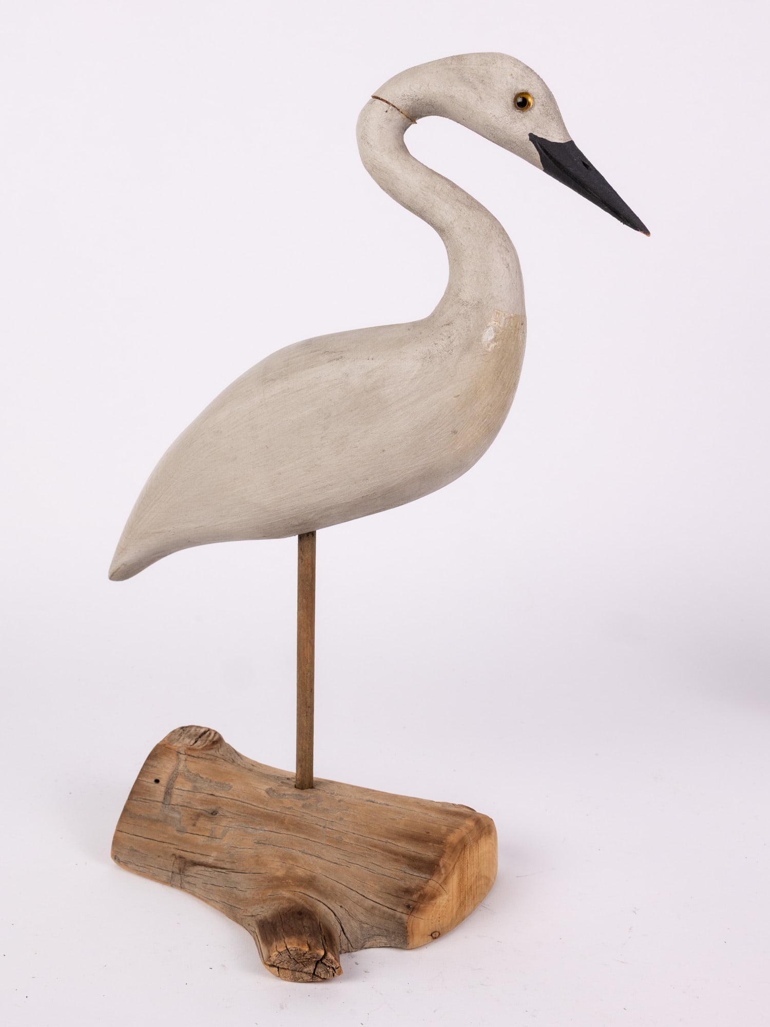 Vintage Hand Carved Great White Egret Decoy: Mounted on a half round driftwood log. There appears to be damage to the joint connecting the head and the neck Size 14.5" H Literature Brooks Auction – Online Auction Terms & Conditions