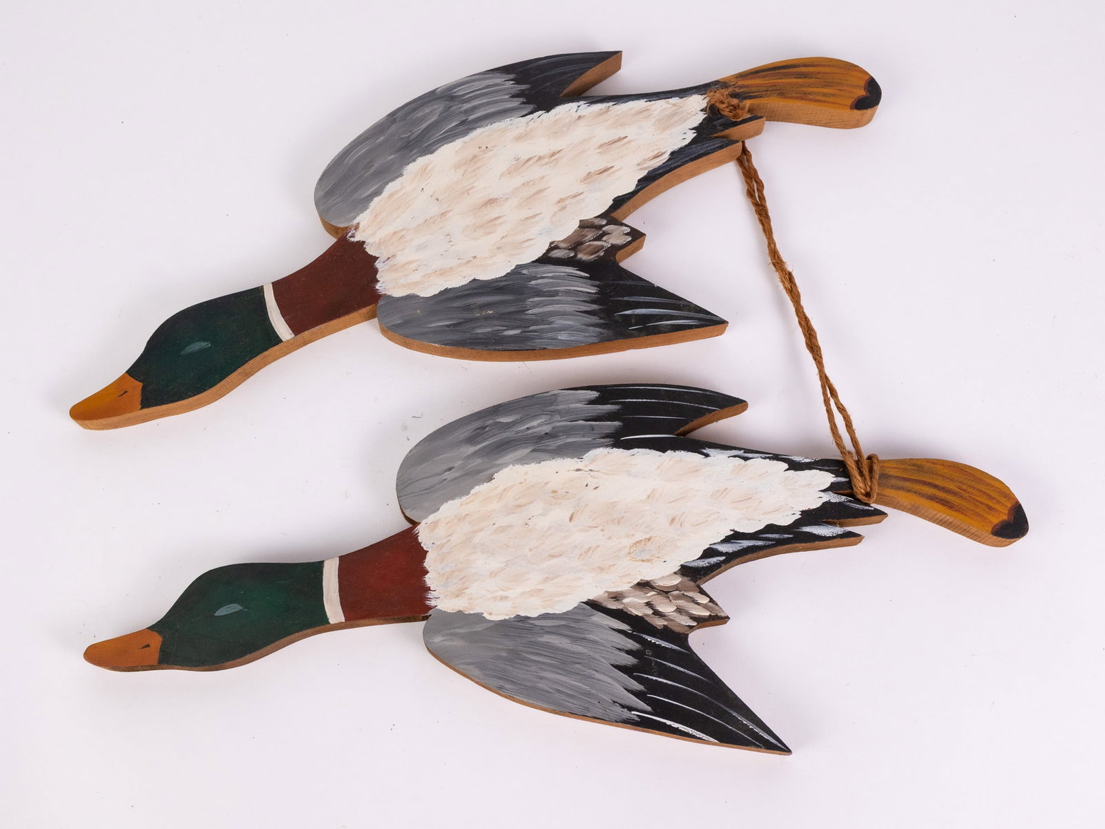 Pair of Vintage Mallard Drake Duck Wall Plaques: Solid wood construction with detailed hand painted feathers & accents Size 7" x 18" Literature Brooks Auction – Online Auction Terms & Conditions Contact: (856) 694-2960 | info@brooks.auction