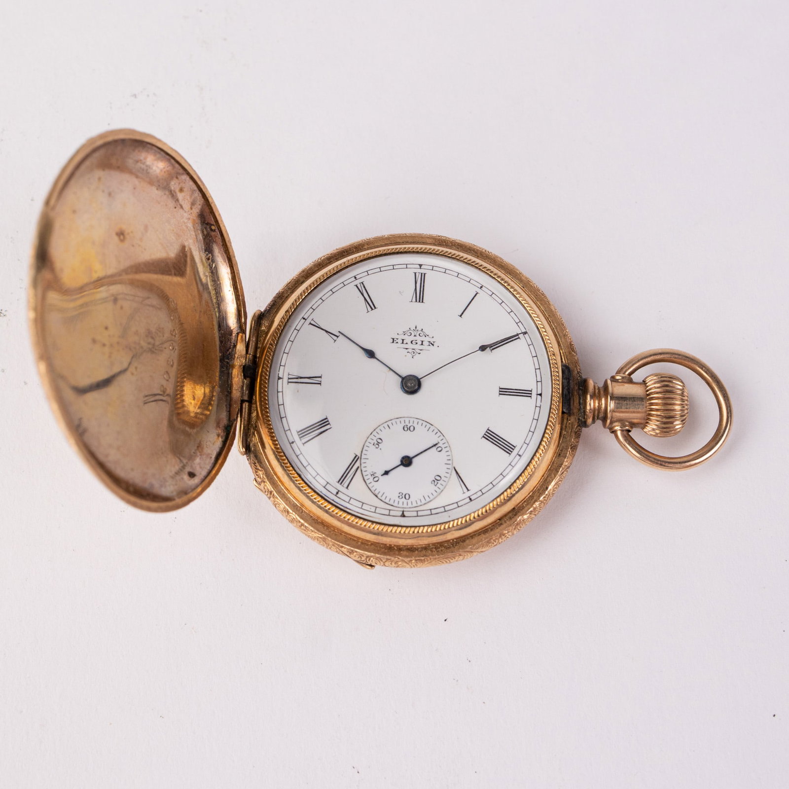 Antique Elgin Violet Motif Safety Pinion Pocket Watch c. 1895: 15 Jewels, case marked 2062986, serial number 6222922. glass for face has come detached. Size 6/s [movement] Literature Brooks Auction – Online Auction Terms & Conditions Contact: (856) 694-296